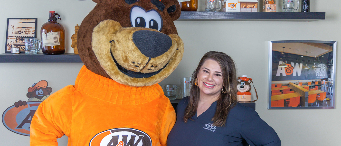 Lauren Knarr and Rooty the Great Root Bear